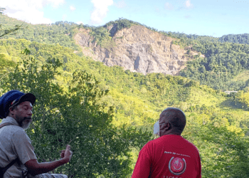 President of AVDAC, Simeon Nakhid and Vice President of MVAC, Kelvin Nakhid, observe effects of quarrying on Maracas Valley landscape