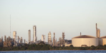 Is Trinidad and Tobago striving to overcome its dependence on fossil fuels?